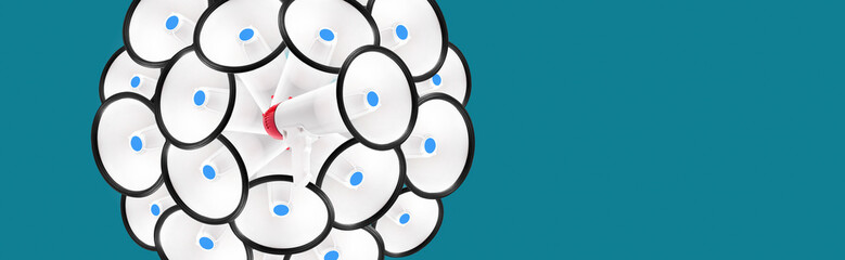 a lot of megaphones in the shape of a circle on blue background with highlight in center, attention concept announcement, panoramic image © alesmunt