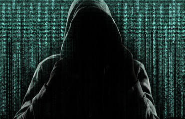 Dark silhouette of cyber criminal against background with digital symbols