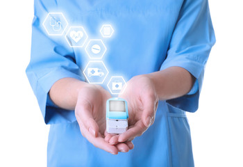 Doctor holding modern medical device and informational icons on white background, closeup