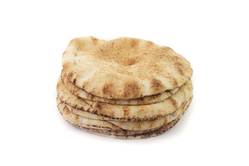 Pita bread isolated on white background. Traditional food of Arabic cuisine and culture