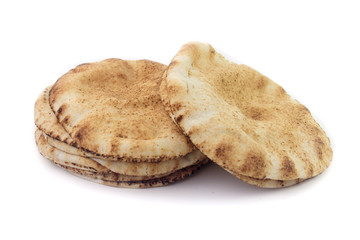 Pita bread isolated on white background. Traditional food of Arabic cuisine and culture