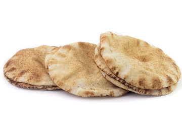 Pita bread isolated on white background. Traditional food of Arabic cuisine and culture