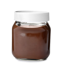 Glass jar with tasty chocolate cream isolated on white
