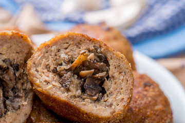cut in half cutlet stuffed with mushrooms and vegetables