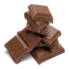 Milk organic chocolate pieces isolated on white background