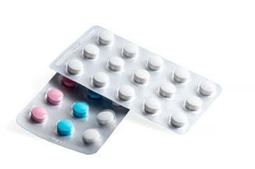 packaging of colored tablets on a white background