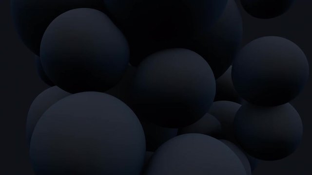 Black balloon floating in motion