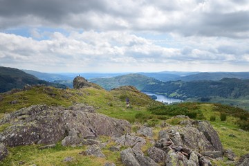 Walker on the summit of Helm Crag