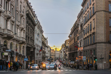 Evening street of Rome. Crossroad