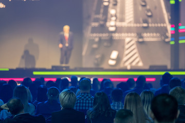 Audience listens to the lecturer at the conference