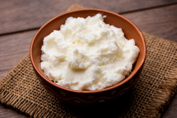 Homemade white Butter or Makhan/Makkhan in Hindi, served in a bowl. selective focus