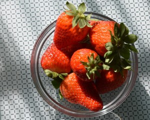 Close-up of a glass bowl with strawberries