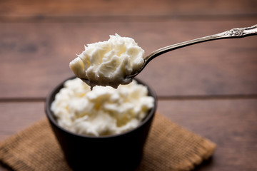 Homemade white Butter or Makhan/Makkhan in Hindi, served in a bowl. selective focus