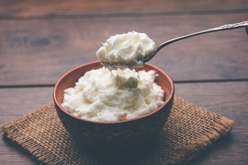 Homemade white Butter or Makhan/Makkhan in Hindi, served in a bowl. selective focus