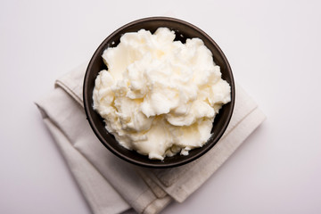 Homemade white Butter or Makhan/Makkhan in Hindi, served in a bowl. selective focus