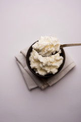 Homemade white Butter or Makhan/Makkhan in Hindi, served in a bowl. selective focus