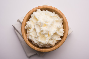 Homemade white Butter or Makhan/Makkhan in Hindi, served in a bowl. selective focus