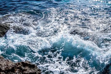 Sea waves wash rocky stones - seascape