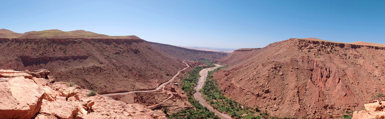 The Atlas Mountains in Morocco, composed of red rocks and the settlement of the Berbers in the...