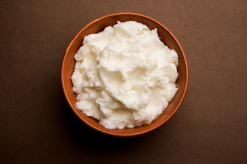 Homemade white Butter or Makhan/Makkhan in Hindi, served in a bowl. selective focus