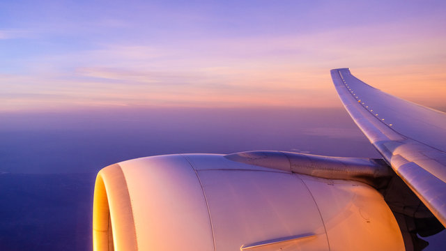 Sunrise over the wing of an aircraft on the route to Vietnam, Asia 