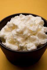 Homemade white Butter or Makhan/Makkhan in Hindi, served in a bowl. selective focus