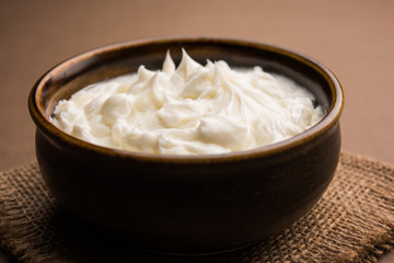 Homemade white Butter or Makhan/Makkhan in Hindi, served in a bowl. selective focus