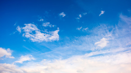 White clouds on a blue sky as background
