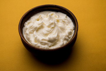 Homemade white Butter or Makhan/Makkhan in Hindi, served in a bowl. selective focus