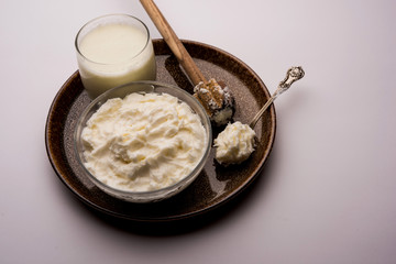 Homemade white Butter or Makhan/Makkhan in Hindi, served in a bowl. selective focus