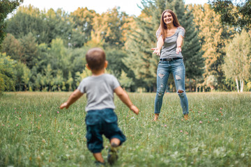 Fototapeta premium Mother play with son in the park.