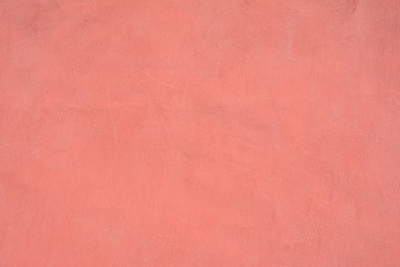 Pink wall with damage.