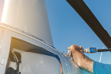 Helicopter being fueled. Refueling a helicopter. Fuel of aviation. Preparing aircraft to fly.