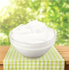 close up of a white beauty cream or yogurt on white background with clipping path