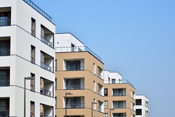 European modern residential architecture. Fragment of a modern apartment building in front. Very modern apartment house. 