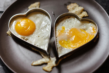 Scrambled eggs in hearts. Love theme