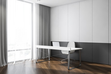 Empty room interior with white desk and window