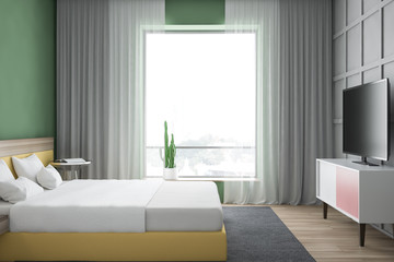Modern design colored bedroom interior with window.