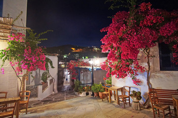 Traditional night view of the square in front of the church of Agia Triada Holy Trinity