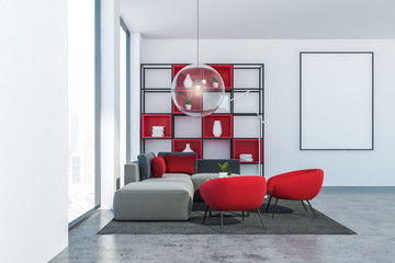 Gray and red loft living room with poster