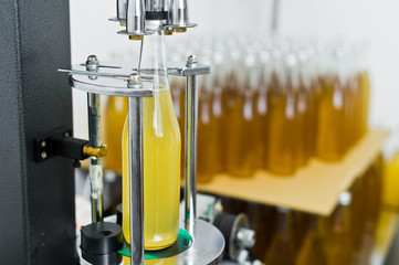 Bottling factory - Beer bottling line for processing and bottling beer into bottles.