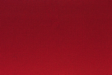 Red colored artificial leather texture background
