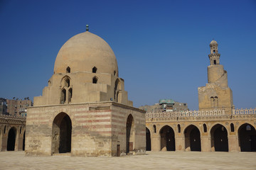 Fototapeta na wymiar Cairo, Egypt: Ablution fountain and minaret of the Mosque of Ibn Tulun (879 AD), the oldest in Cairo surviving in its original form and the largest.