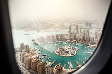 Doha, the capital of the state of Qatar. View from the airplane window.