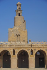 Fototapeta na wymiar Cairo, Egypt: The minaret of the Mosque of Ibn Tulun (879 AD) -- the oldest in Cairo surviving in its original form and the largest in land area.