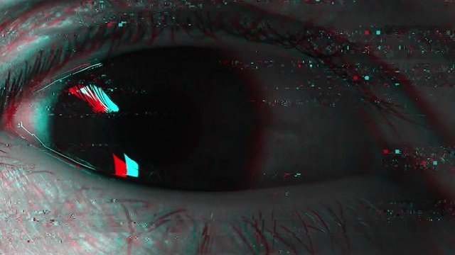Spooky human eye with glitch effect as horror mystery and psychopathy concept