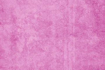 Pink wall with concrete texture as a background