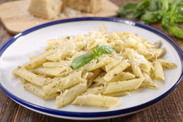 Penne with Parmesan cheese and basil leaf