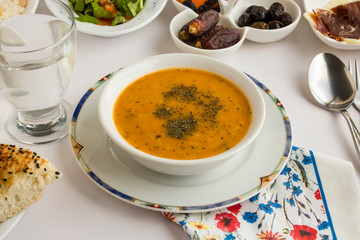 Close-up taken of Ramadan-Iftar Turkish soup on white Ramadan Dinner.