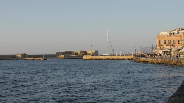 The Venetian era harbour and lighthouse at the Mediterranean port of Chania, Crete